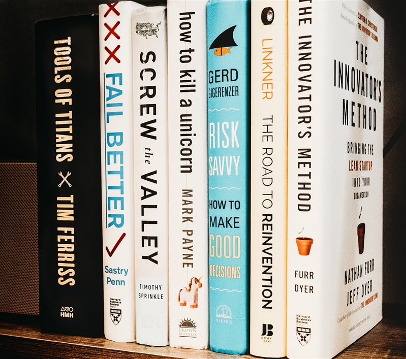 Books on a shelf with spines facing outward